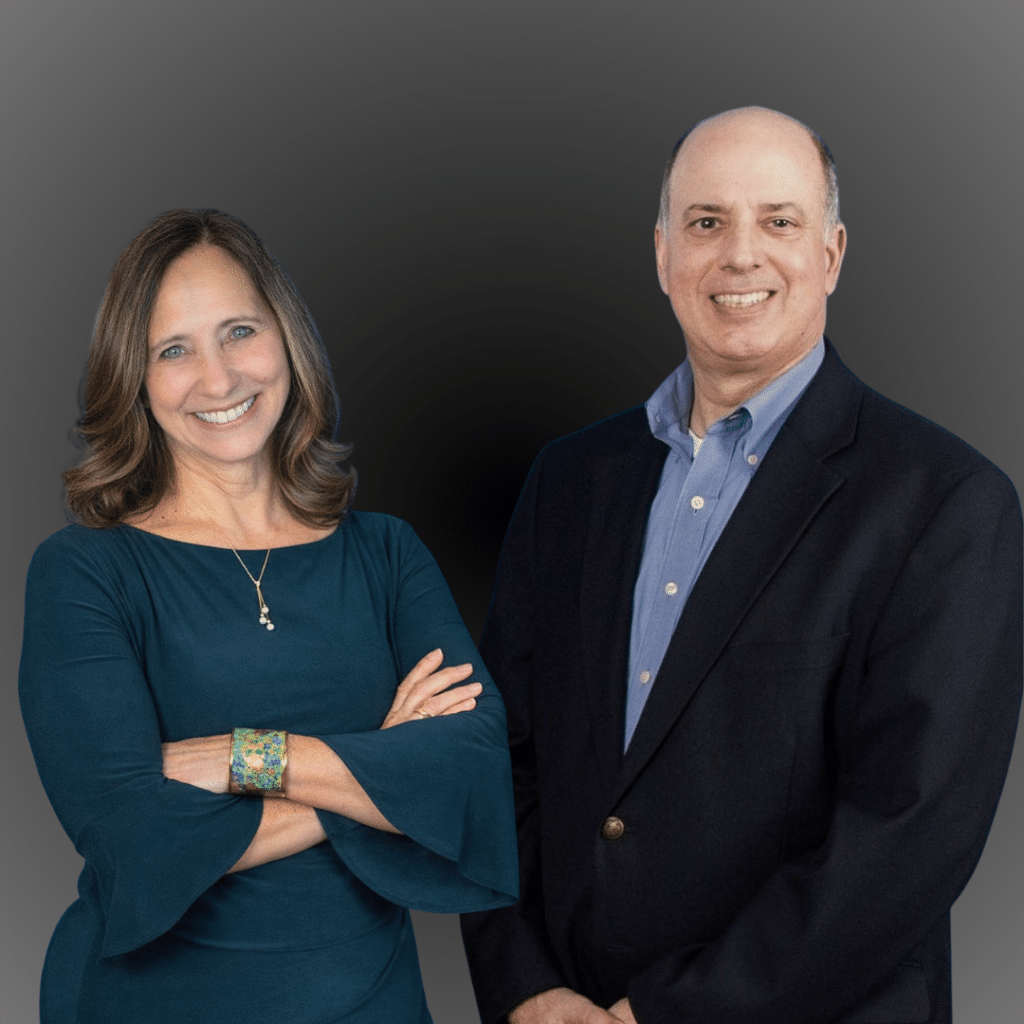 Business Coach Sandy Merritt standing next to Business Coach Mark McNulty